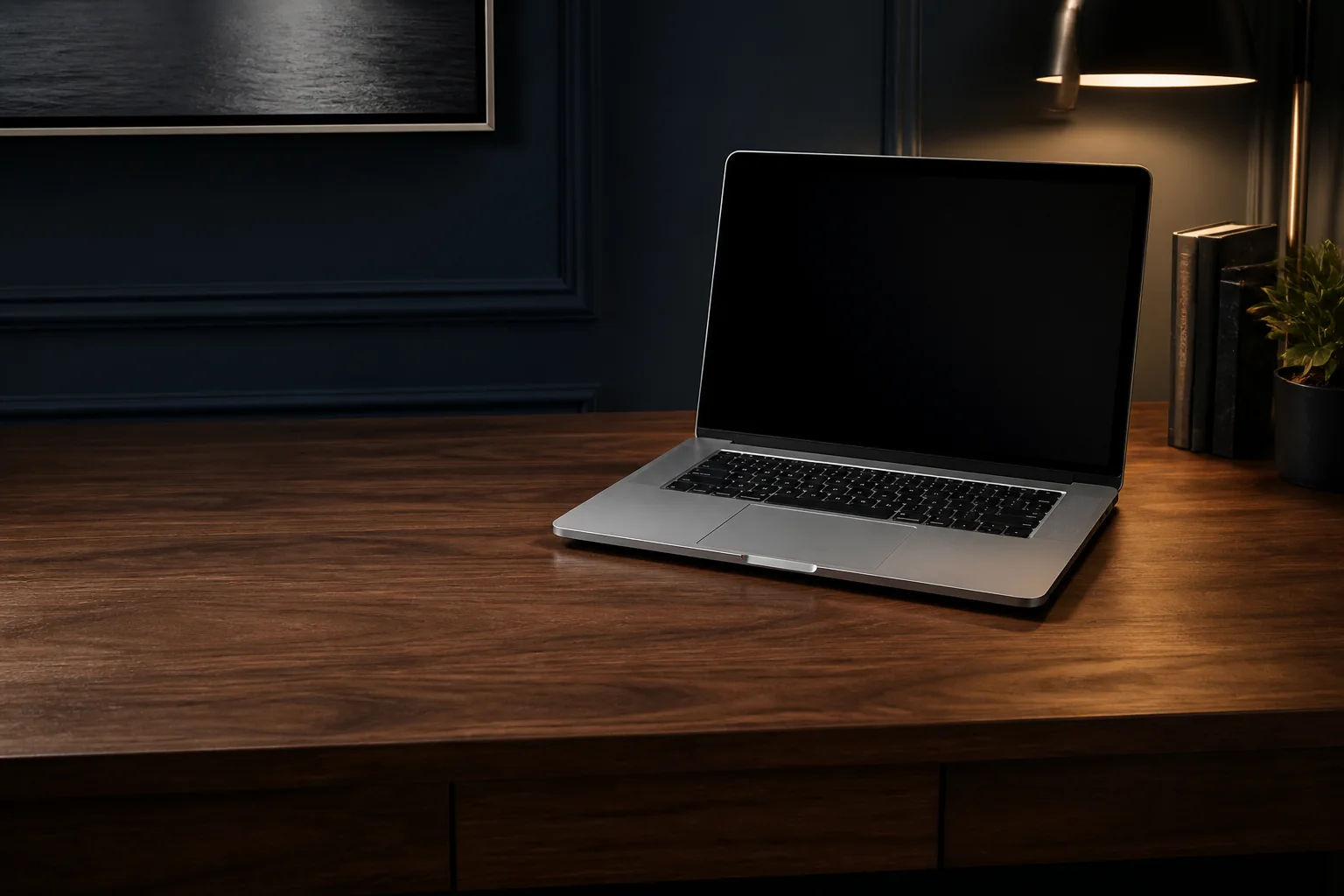 Silver laptop on a desk for Mac repair in Niagara