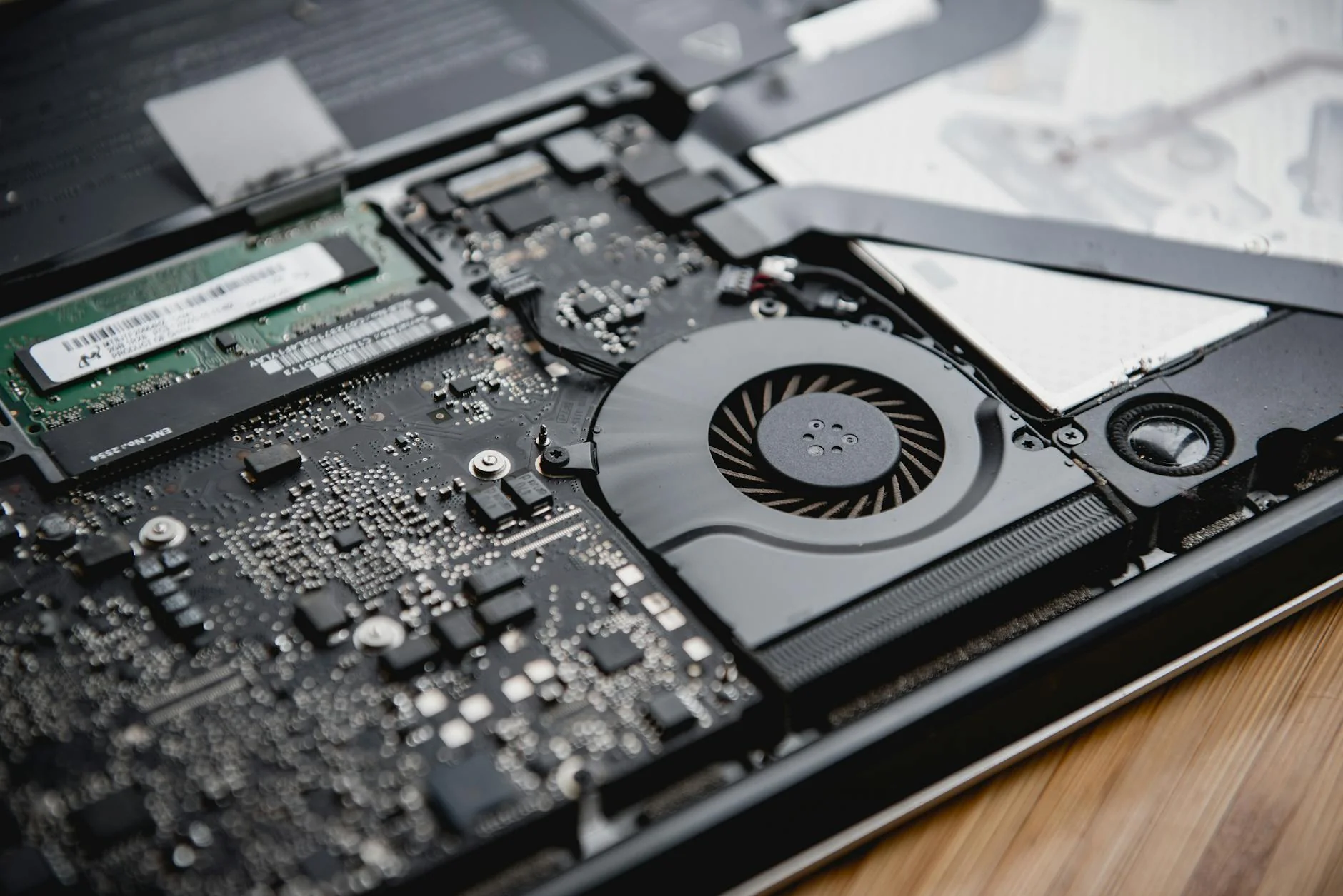 Technician repairing a laptop
