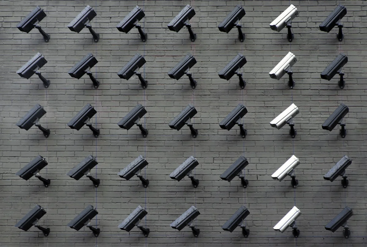 Monitoring wall displaying multiple surveillance feeds illustrative graphic